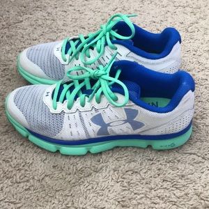 Under armour blue, teal, and white micro shoes